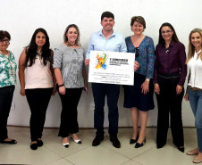 João Rafael Iensen, Diretor do DEPSD/SESP-PR e Comissão Avaliadora - da esquerda para a direita - Regina Vitório (SEED), Jéssica Barbosa (SESP), Gisele Mantovani (SINEPE), Cristina Ruaro (CONESD), Raquel Cavalheiro (ALEP) e Patrícia Moscal (SECS).