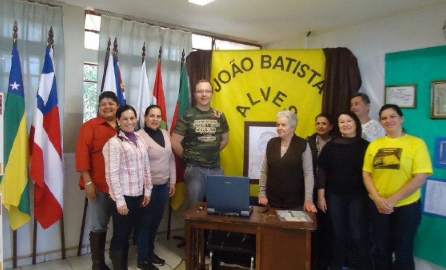 Homenagem a Joao Batista Alves, com seu filho Hugo e viúva Alice.